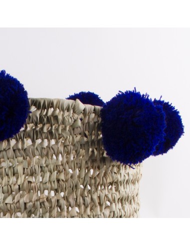 Set van palmbladeren manden met indigo kwastjes