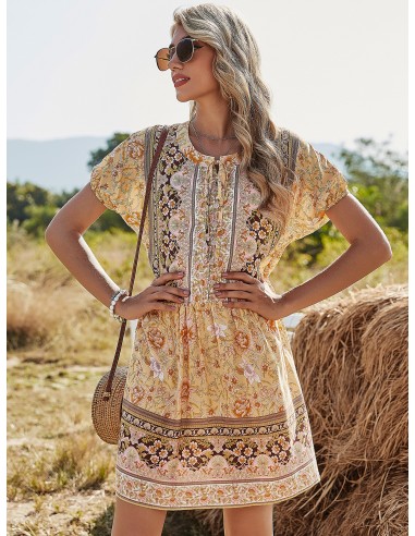 Robe courte jaunes arabesques fleuries