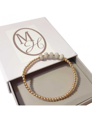 Bracelet with golden beads and faceted white jasper