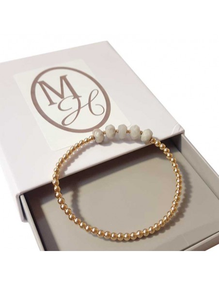 Armband met gouden kralen en facetgeslepen witte jaspis