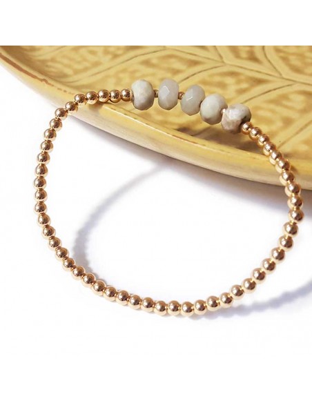 Bracelet en jaspe blanc facetté perles dorées