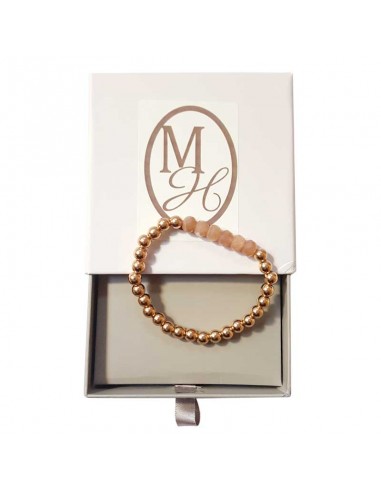 Armband met dikke gouden kralen en facetgeslepen zonnesteen