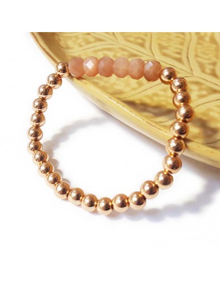 Armband met dikke gouden kralen en facetgeslepen zonnesteen