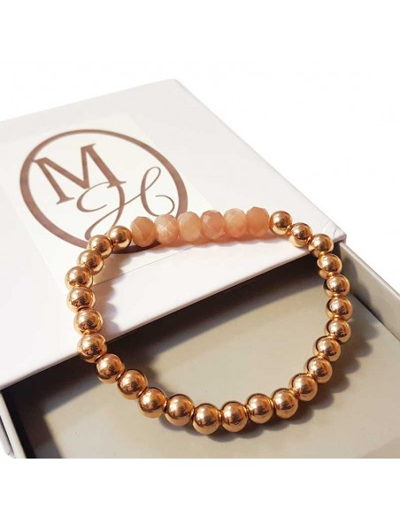 Bracelet with thick golden beads and faceted sunstone