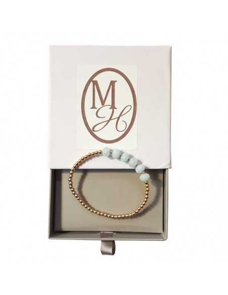 Bracelet à perles dorées et aigue-marine facettée