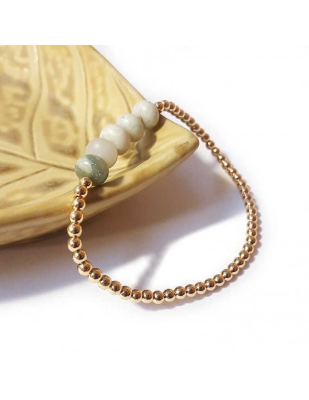 Armband met gouden kralen en witte jaspis rond