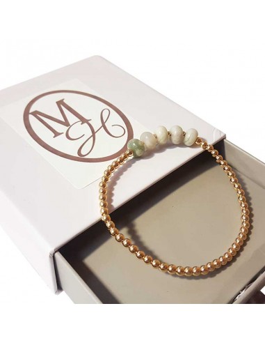 Armband met gouden kralen en witte jaspis rond