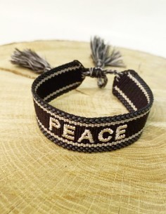 Stoffen armband met geborduurde kwastjes PEACE