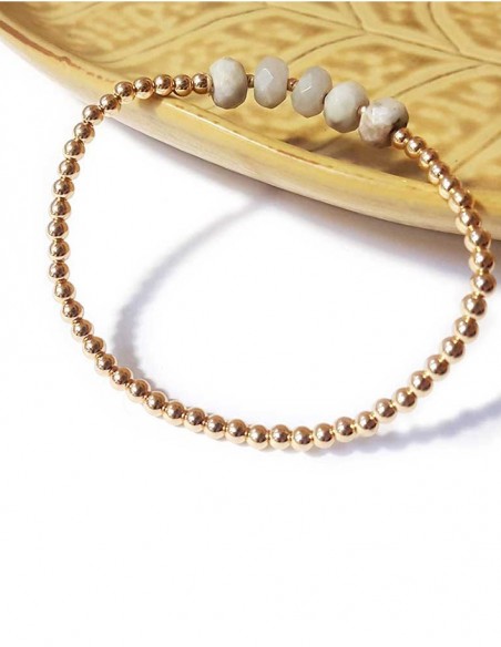 Bracelet à perles dorées et jaspe blanc facetté