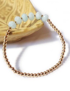 Bracelet à perles dorées et aigue-marine facettée