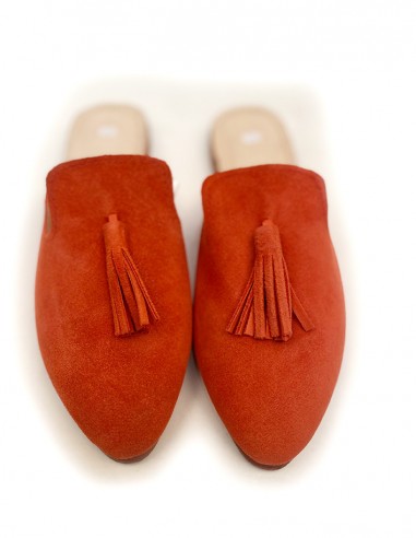 Suede moccasin sandal with coral orange pompon