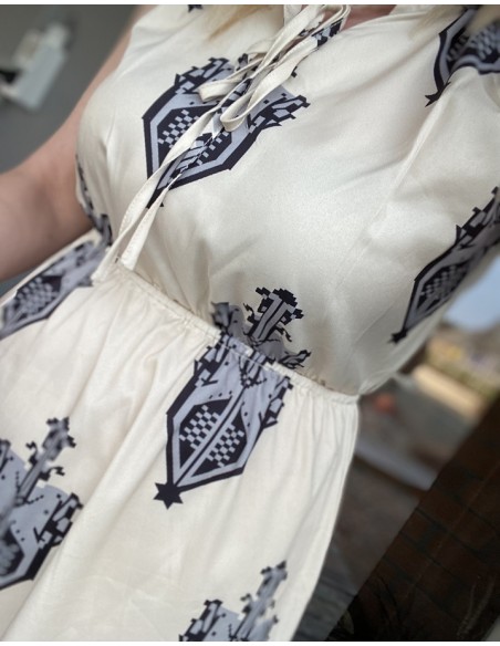 Bohemian long dress with beautiful prints and V-neckline cutout