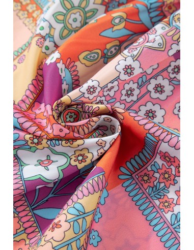 Blouse florale bohème à manches bouffantes et col à liens